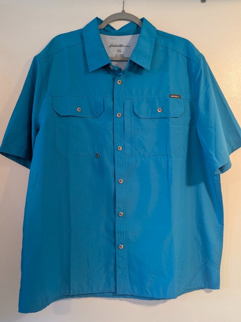 Eddie Bauer bright blue fishing shirt